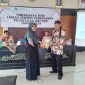 Foto : Kepala Puskesmas Gapura dr Suci Hernawati, M.Kes. dan Camat Gapura Imam Suhadi