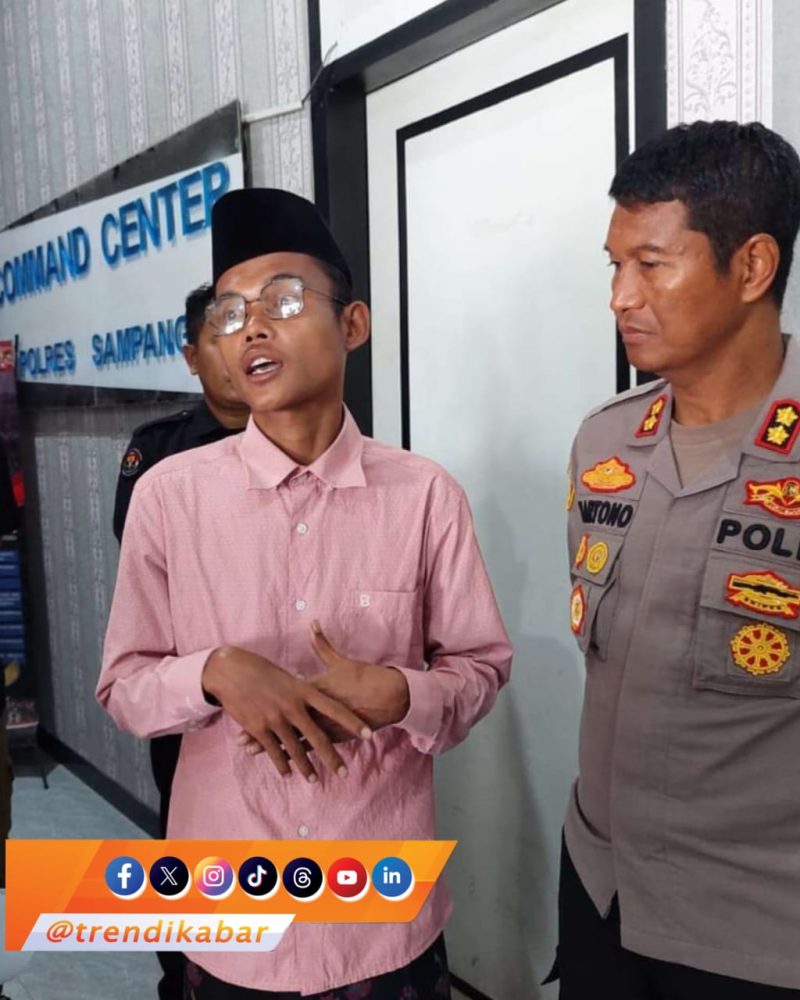 Foto : Konten kreator kontroversial asal Desa Lar Lar, Kecamatan Banyuates, Kabupaten Sampang, Madura Abdullah (kemeja pink) atau biasa dikenal Dullo saat berada di Mapolres Sampang.