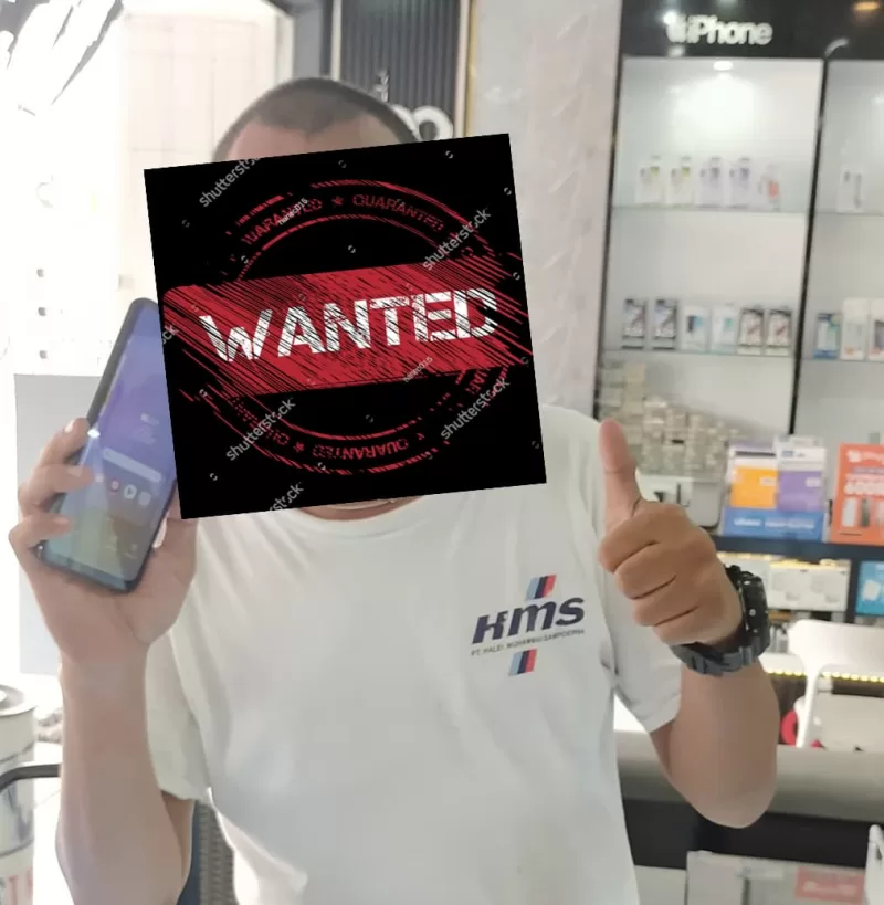 Foto: Sosok terduga pelaku pencurian iPhone di DJ 99 Store.
