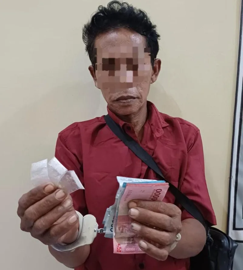Foto: Seorang pria berinisial E.H. (55) diamankan di rumahnya di Dusun Ban-ban, Desa Talango, Kecamatan Talango. 