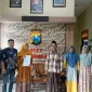 Foto: Mahyuni saat melaporkan dugaan penebangan pohon tanpa izin ke Polsek Batang-Batang, Selasa (19/5/2026).
