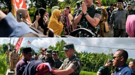 Foto: Pangdam V/Brawijaya menyapa warga saat meninjau pembangunan jembatan di Ambunten, Sumenep.