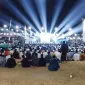 Foto: Ribuan jamaah mengikuti pengajian dan pembacaan Sholawat Nariyah Ittisholana di Lapangan Kecamatan Batang-Batang, Sumenep.
