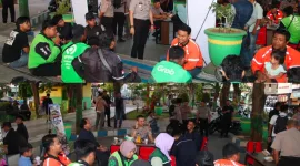 Foto: Kapolresta Sumenep bersama masyarakat saat mengikuti kegiatan Ngopi Bareng Masyarakat di kawasan Taman Bunga Sumenep.